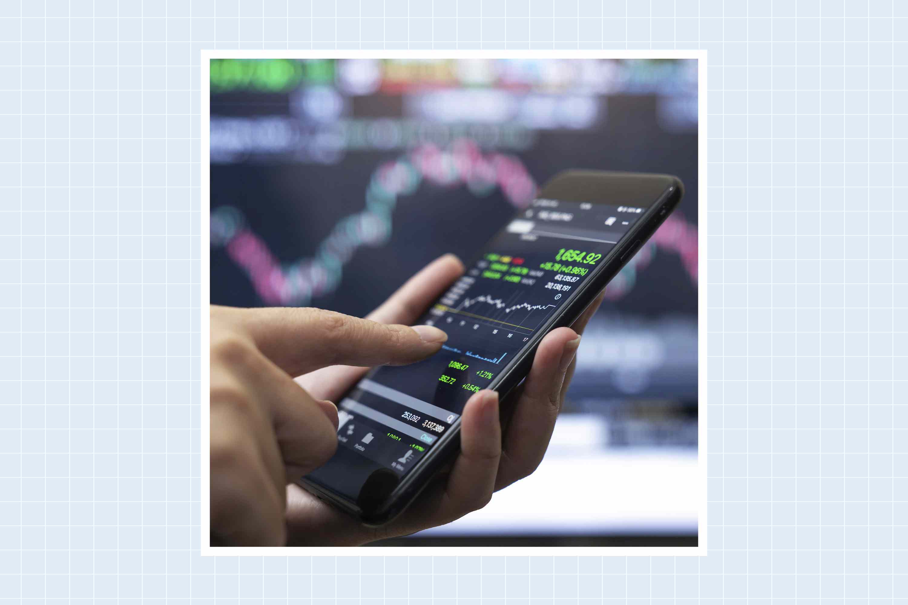 Person typing in stock market app
